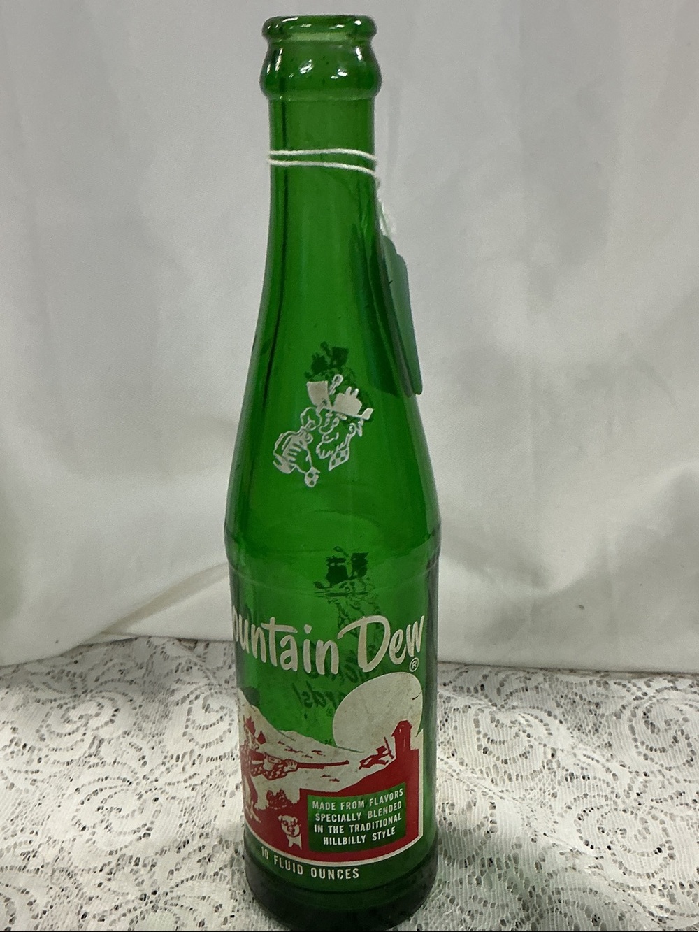 Green Glass Mountain Dew Bottle